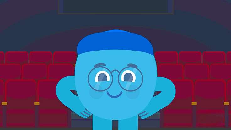 Blue cartoon character with glasses in front of red theater seats.